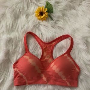 Orange tie dye sports bra